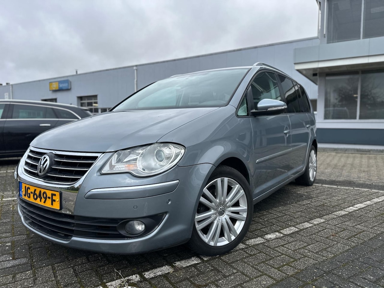 Volkswagen Touran - 1.4 TSI Highline | 7 Persoons | Pano | PDC | Climate | Stoelverw | Park assist | Goed onde - AutoWereld.nl