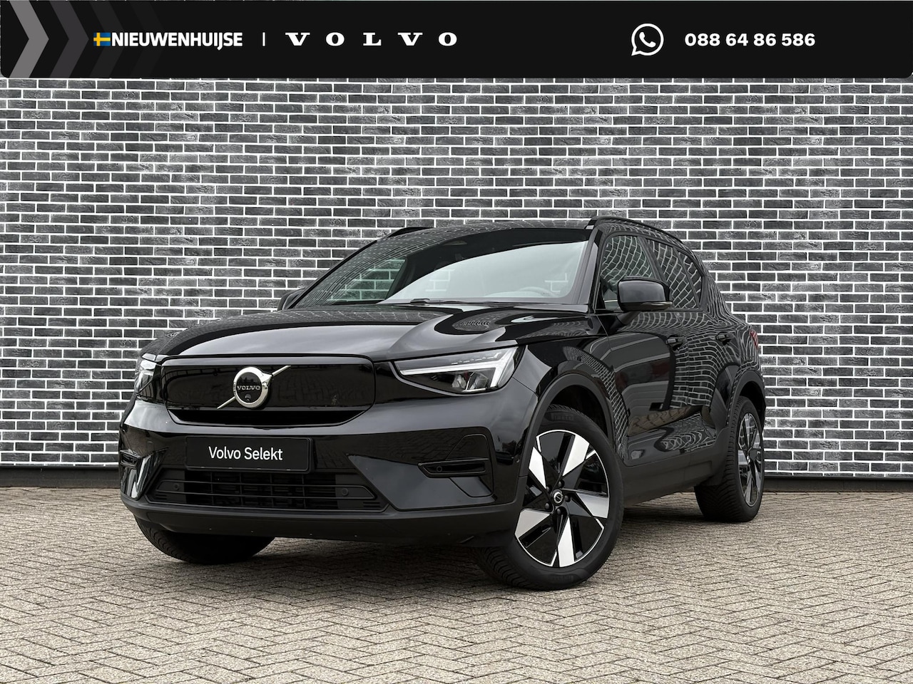 Volvo EX40 - Single Motor Extended Range Ultra 82 kWh | Stuur-/Stoelverwarming | Getint Glas | All-seas - AutoWereld.nl