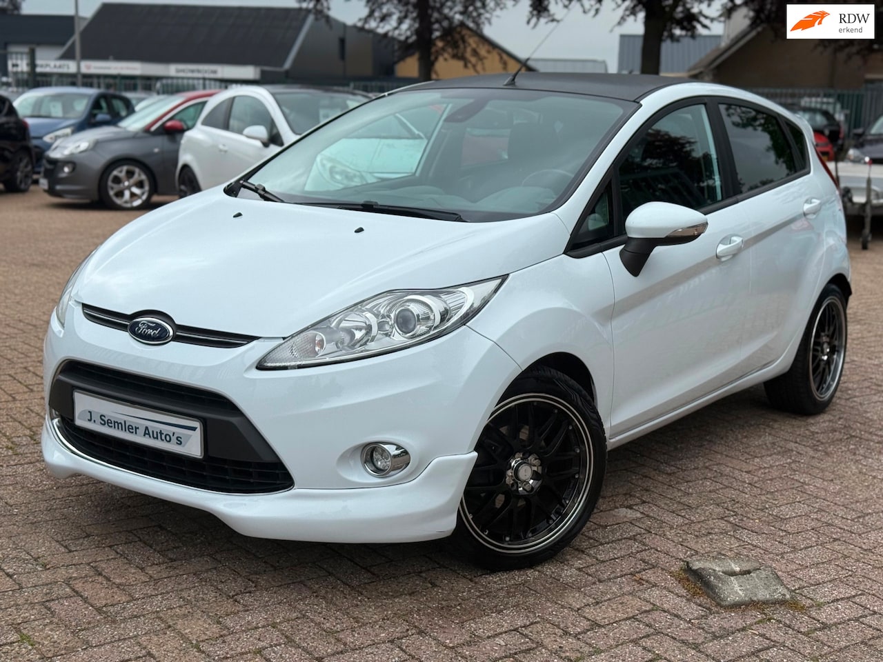 Ford Fiesta - 1.25 Titanium ST-LINE 5DEURS AIRCO CRUISE CTRL NAP APK 04-2027 - AutoWereld.nl