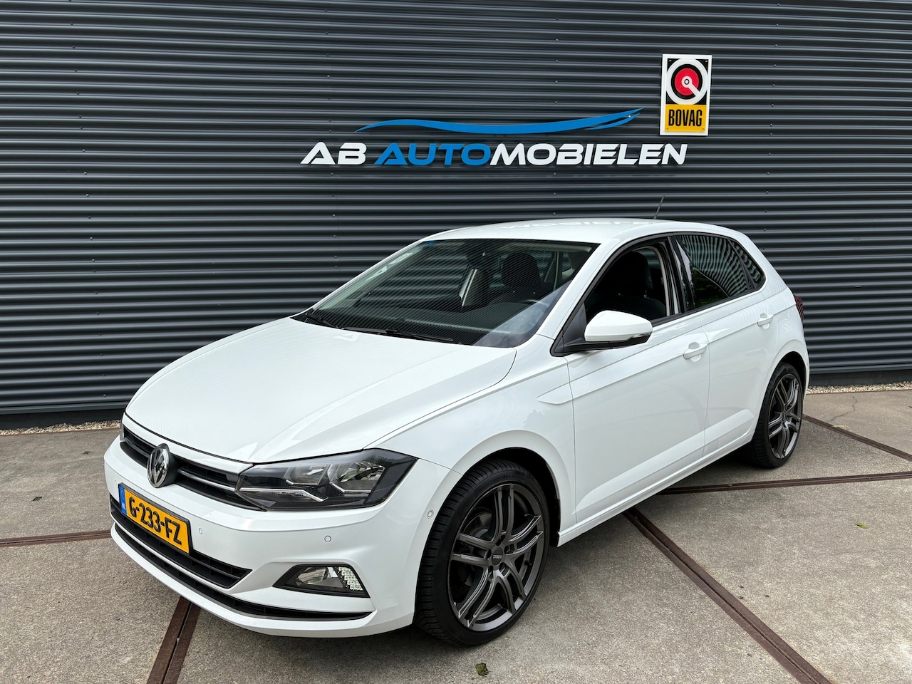 Volkswagen Polo - 1.0 TSI Comfortline Business AUTOMAAT/ CAMERA/ PARK ASSIST - AutoWereld.nl