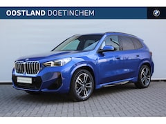 BMW X1 - xDrive23i High Executive M Sport Automaat / Trekhaak / Sportstoelen / Stoelverwarming / Ad