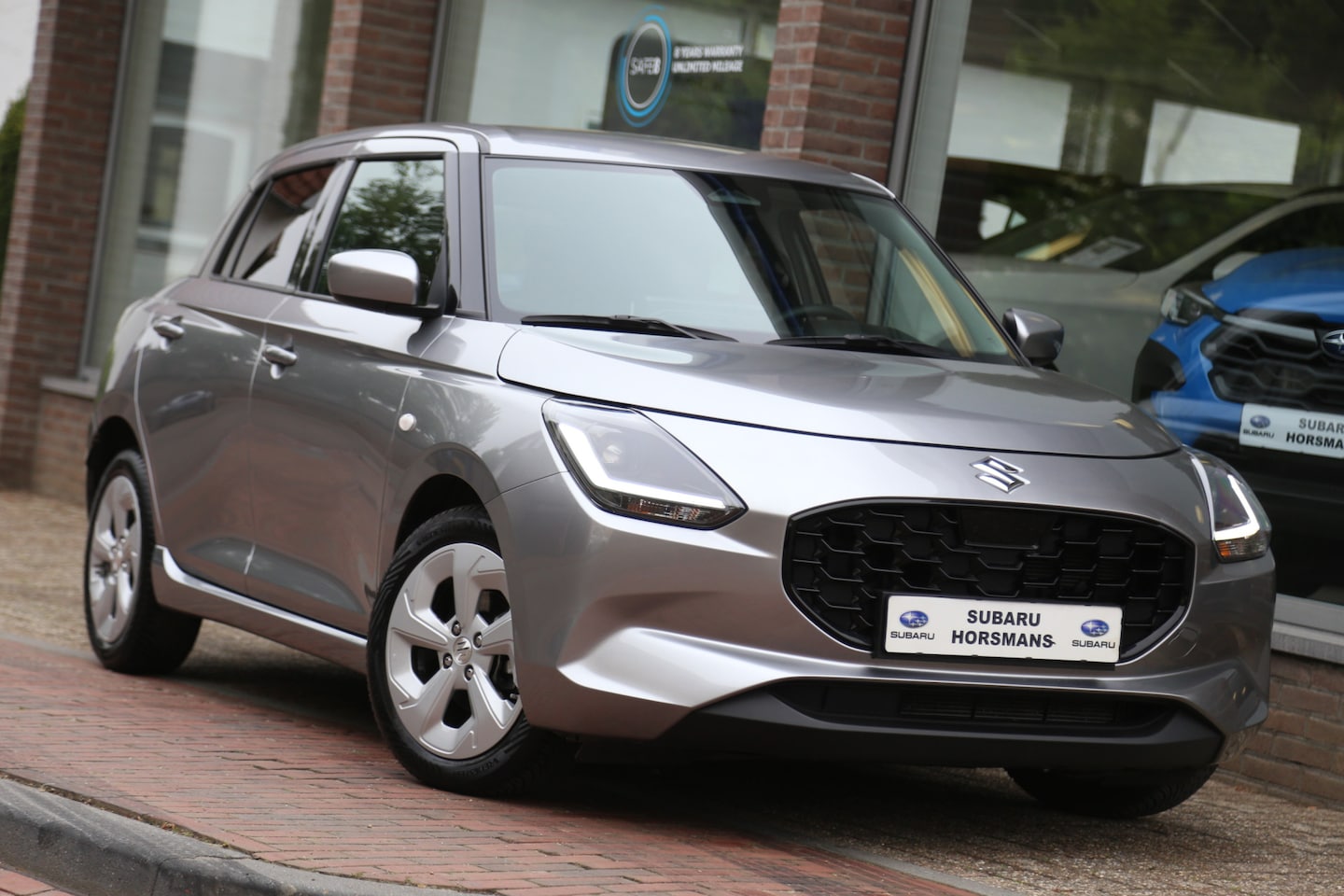 Suzuki Swift - 1.2 Style Smart Hybrid Navi Camera ACC Stoelverwarming - AutoWereld.nl