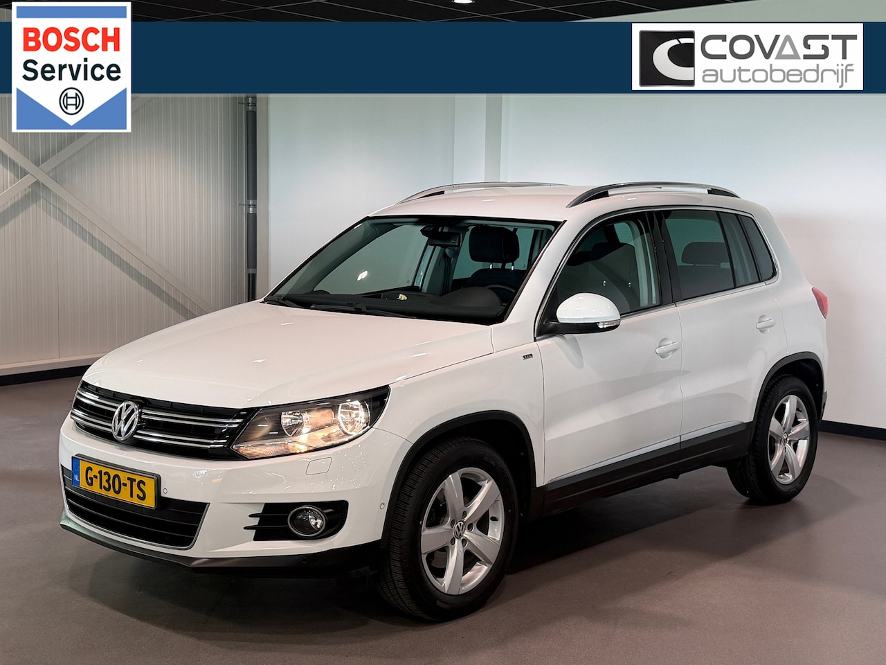 Volkswagen Tiguan - 1.4 TSI Cup! Navigatie|Inparkeerhulp|PDC|CruiseControl - AutoWereld.nl