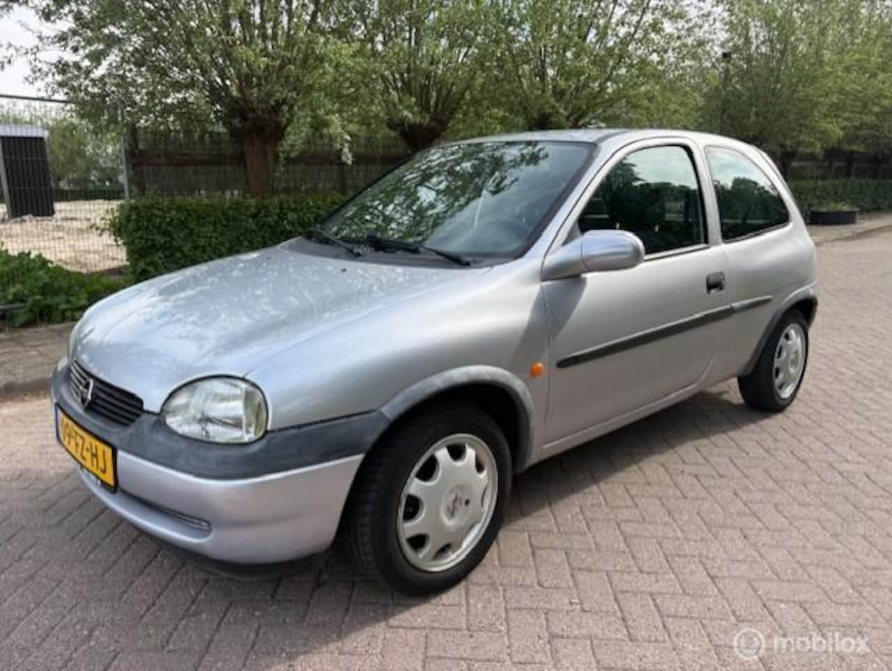 Opel Corsa - 1.2i-16V Strada AUTOMAAT - AutoWereld.nl