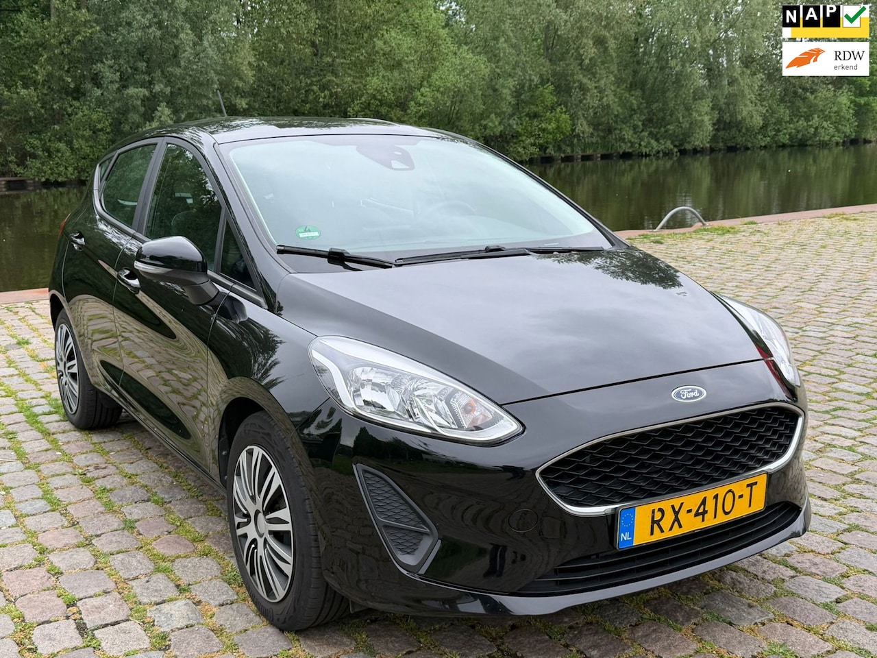 Ford Fiesta - 1.1 Trend navigatie cruis control airco elektrische ramen cv op afs - AutoWereld.nl