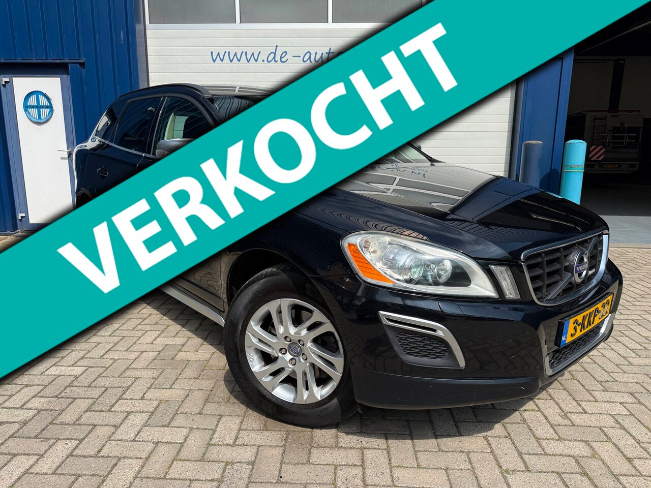 Volvo XC60 - 2.4 D5 215pk AWD R-Design / AUTOMAAT / NAVI / LEER / TREKHAAK - AutoWereld.nl