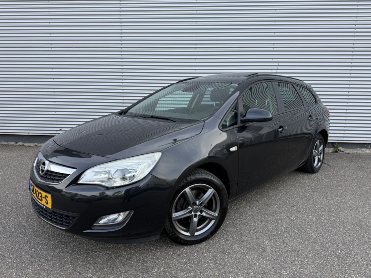 Opel Astra Sports Tourer - 1.4 Turbo Cosmo pano Airco Cruise 16" lichtmetaal - AutoWereld.nl