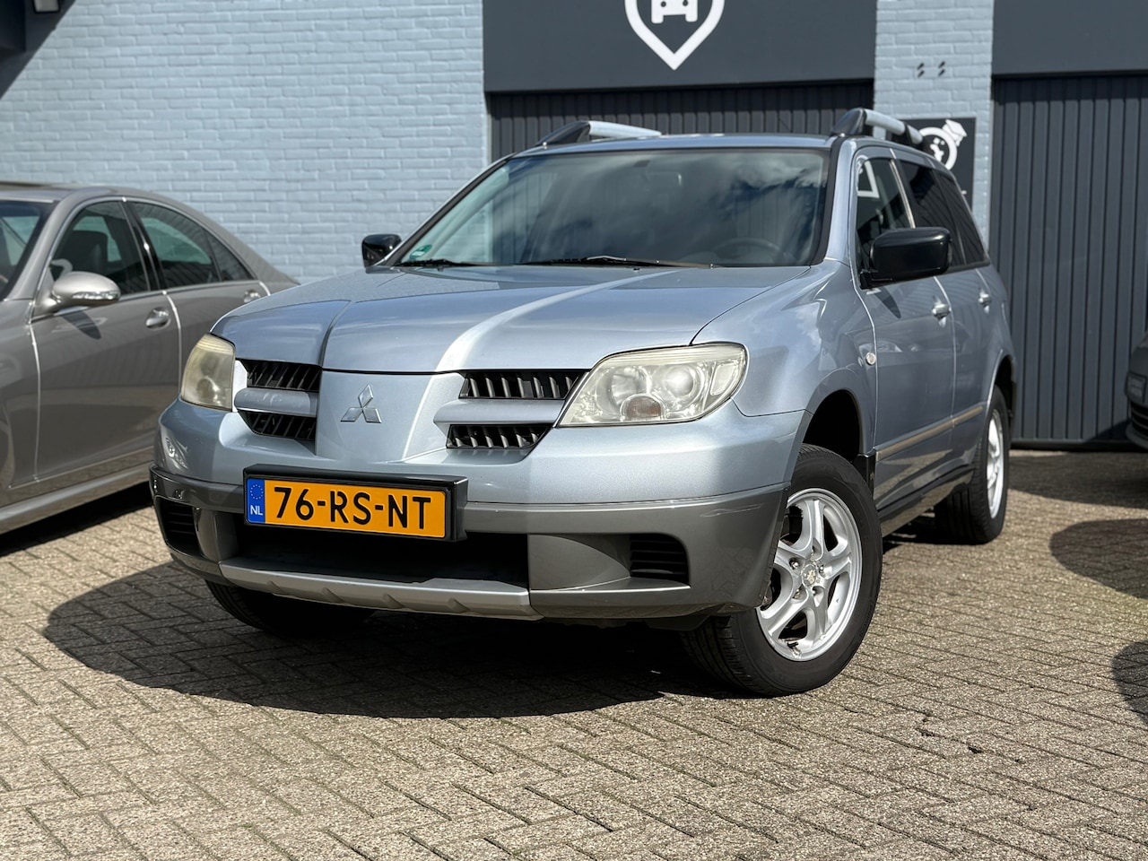 Mitsubishi Outlander - 2.0 Invite | Airco | Cruise | APK - AutoWereld.nl