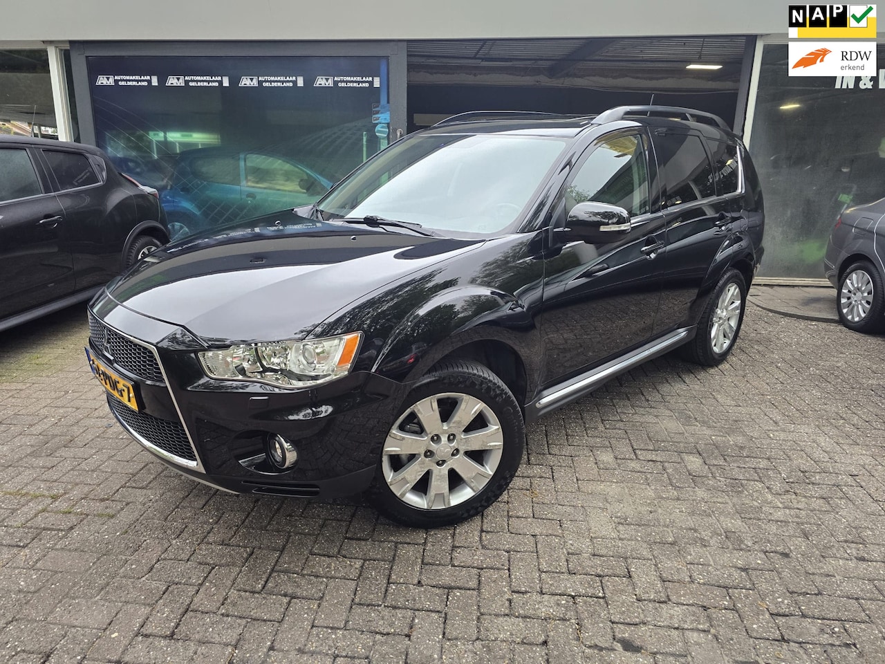 Mitsubishi Outlander - 2.4 Instyle | 1E EIGENAAR | AUTOMAAT | 7 PERS | SCHUIF DAK | 12MND GARANTIE | CAMERA | LED - AutoWereld.nl