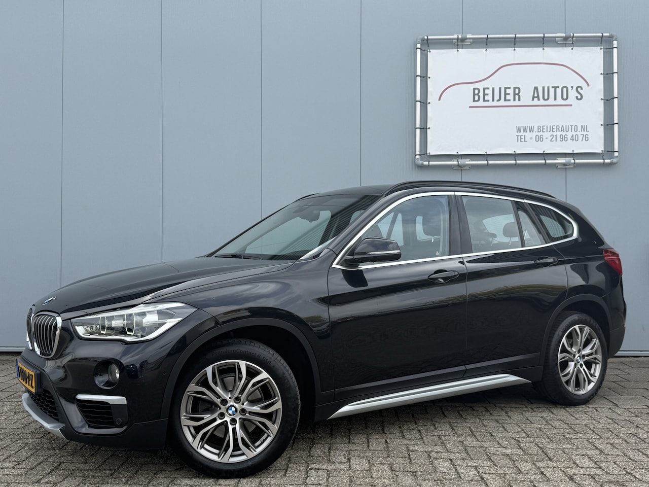 BMW X1 - sDrive18i High Executive Automaat/Trekhaak/Camera. - AutoWereld.nl