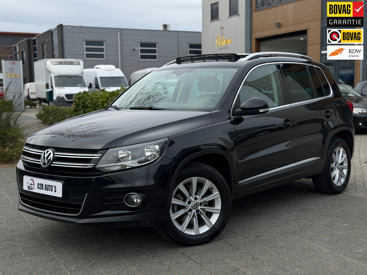 Volkswagen Tiguan - 2.0 TSI Sport&Style | Automaat | Airco | NAP | Pano|Garantie - AutoWereld.nl