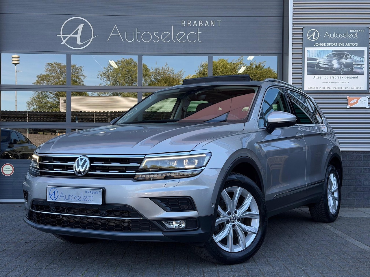 Volkswagen Tiguan - 1.4 TSI 4Motion Highline Pano Navi Camera - AutoWereld.nl