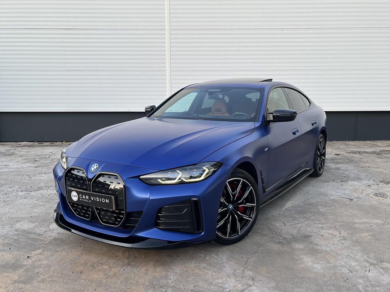 BMW i4 - eDrive40 High Executive 84 kWh * M-Sport * Pano * HUD * 360 Camera * NAP - AutoWereld.nl