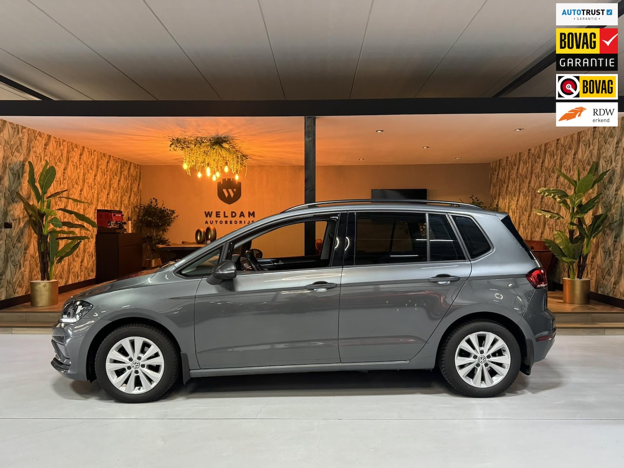 Volkswagen Golf Sportsvan - 1.0 TSI Comfortline Garantie Trekhaak Carplay Adoptieve Cruise Navi Clima Led Dab PDC Rijk - AutoWereld.nl