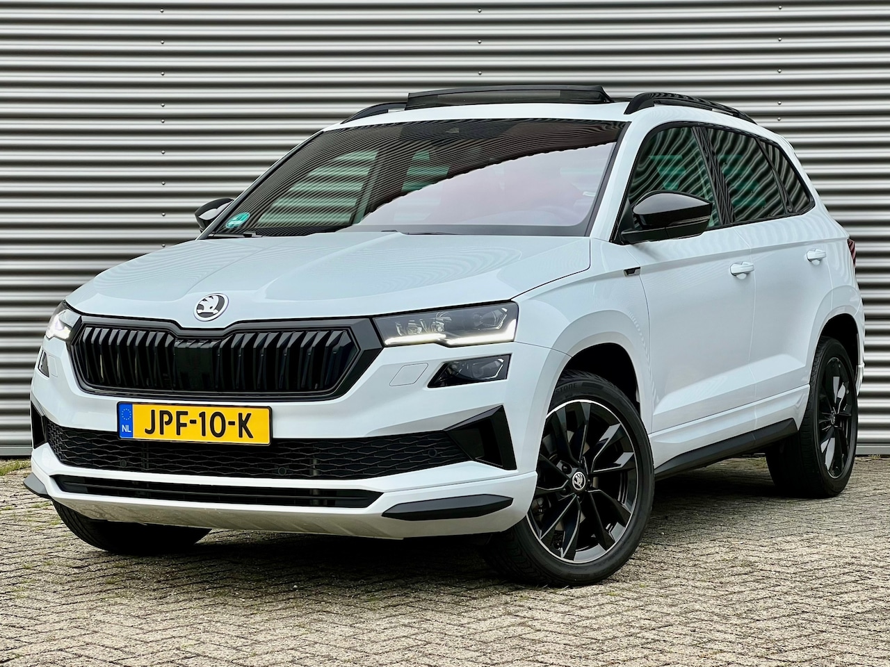 Skoda Karoq - 1.5 TSI ACT Sportline Business DSG | Panorama | Navigatie | Dealer Onderhouden | 1e Eigena - AutoWereld.nl