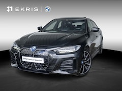 BMW i4 - eDrive40 | M Sport | Stoelverwarming | Schuif-/kanteldak | Active Cruise Control | Parking
