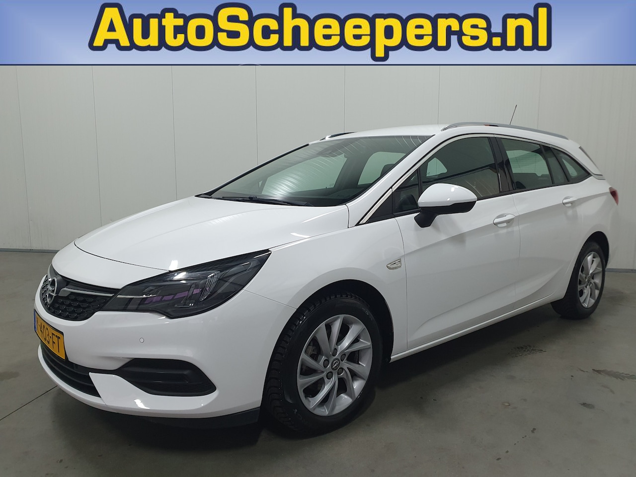 Opel Astra Sports Tourer - 1.2 Elegance NAVI/PDC/CRUISE/CLIMA/LMV - AutoWereld.nl