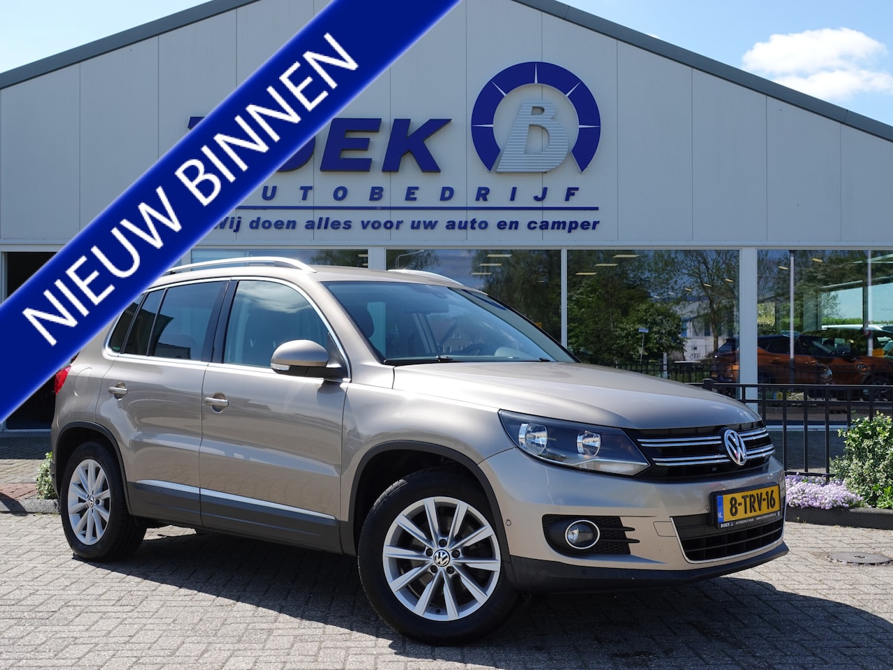 Volkswagen Tiguan - 1.4 TSI 160PK Sport&Style TREKH. | PDC V+A | NAVI | CRUISE | BT-TEL - AutoWereld.nl