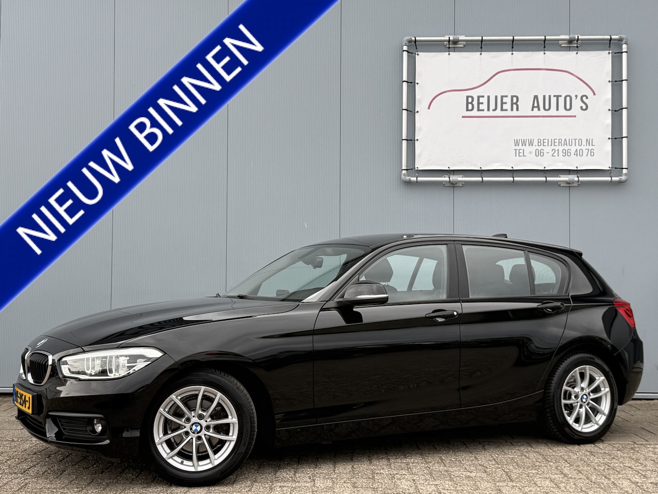 BMW 1-serie - 118i Executive Automaat/Navi/Climate. - AutoWereld.nl