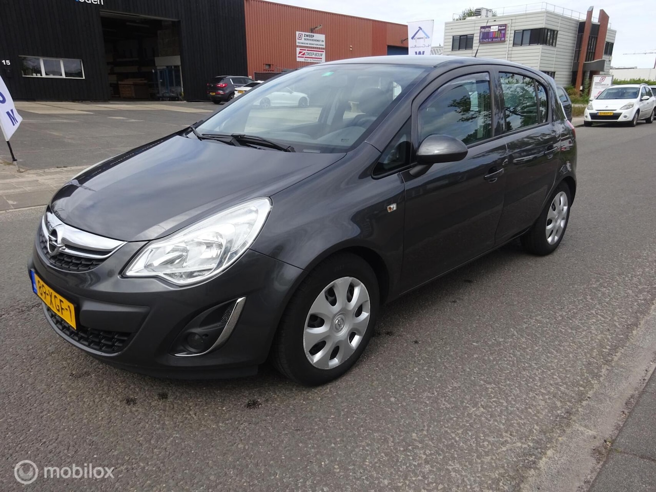Opel Corsa - 1.2 Ann Ed!/CRUISE/AIRCO/TREKHAAK/HALF LEDER!! - AutoWereld.nl