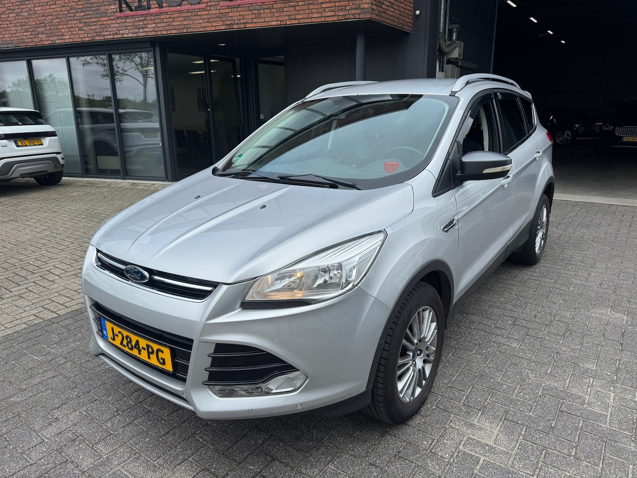 Ford Kuga - 1.6 Titanium Plus CRUISE TREKHAAK STOELVERW PDC SUPER ONDERHOUDEN - AutoWereld.nl