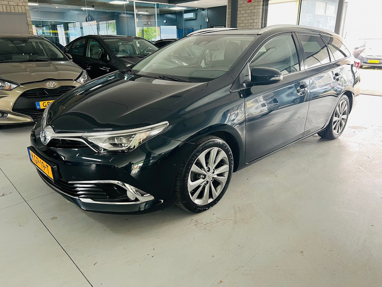 Toyota Auris - 1.8 Hybrid Dynamic 1.8 Hybrid Dynamic - AutoWereld.nl
