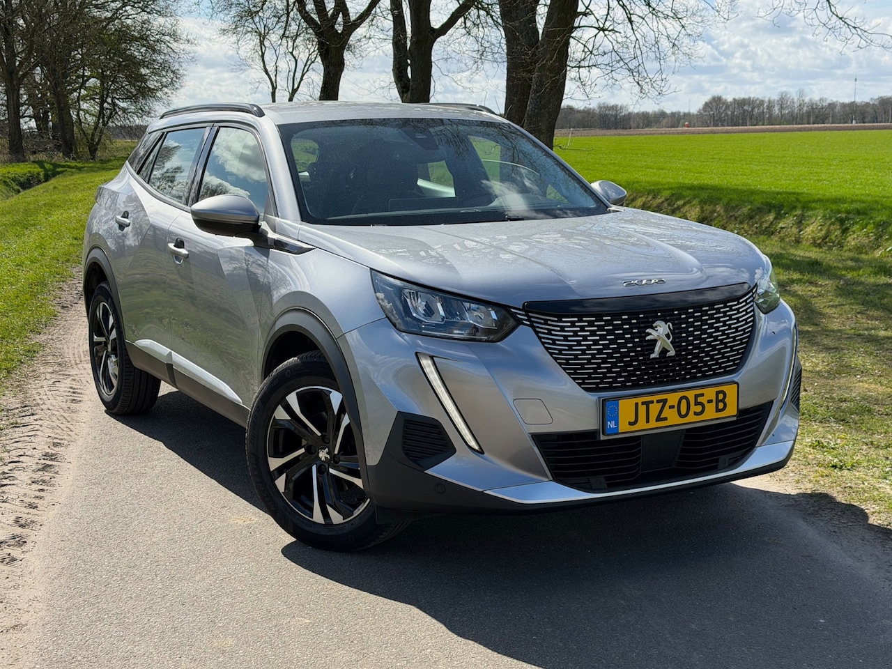 Peugeot 2008 - 1.2 PureTech allure | Clima | Cruise | Navi | - AutoWereld.nl