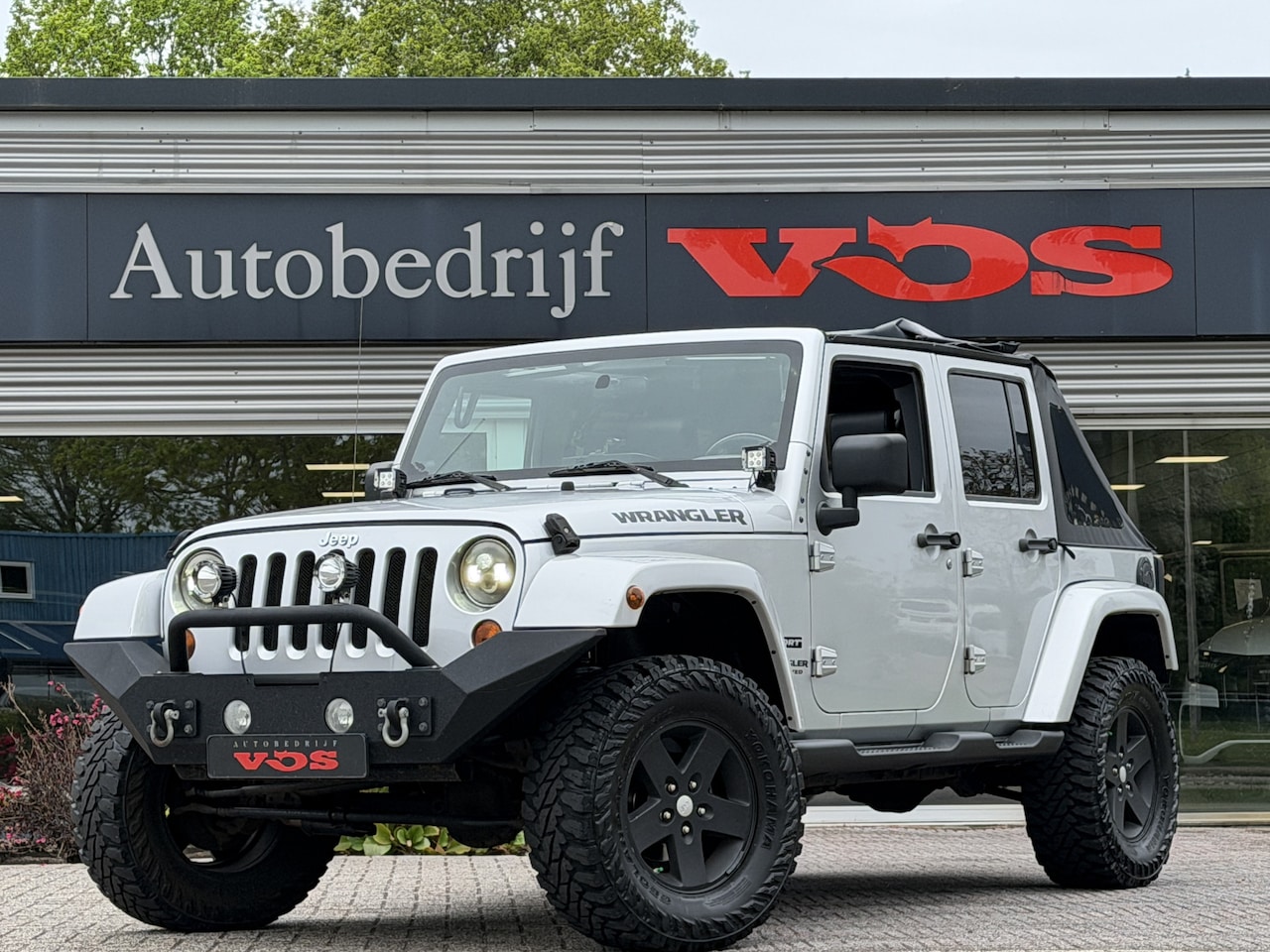 Jeep Wrangler Unlimited - 3.8 Sahara | V6 | Hardtop | Softtop | Verhoogd | - AutoWereld.nl