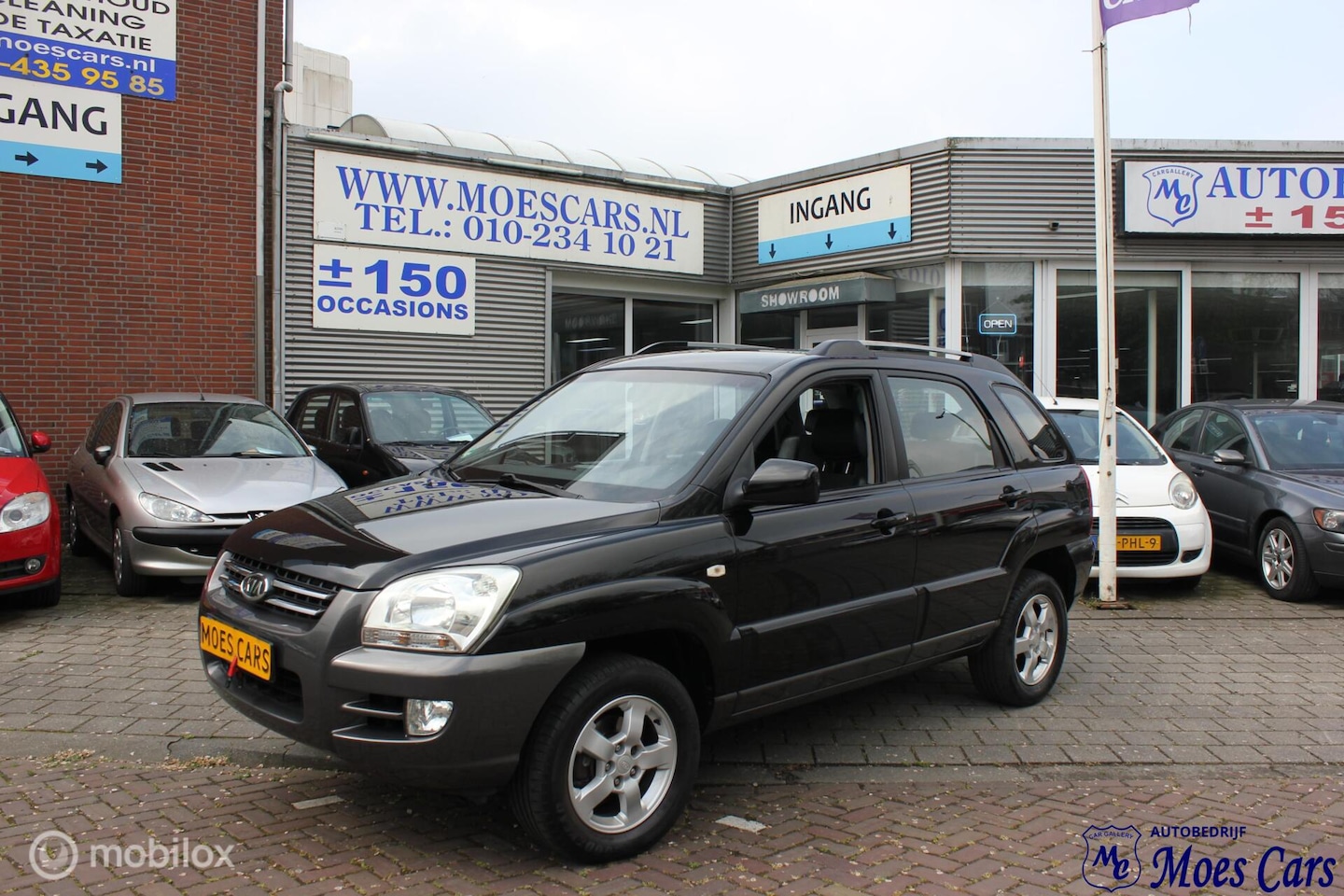 Kia Sportage - 2.0 CVVT Executive 2.0 CVVT Executive - AutoWereld.nl