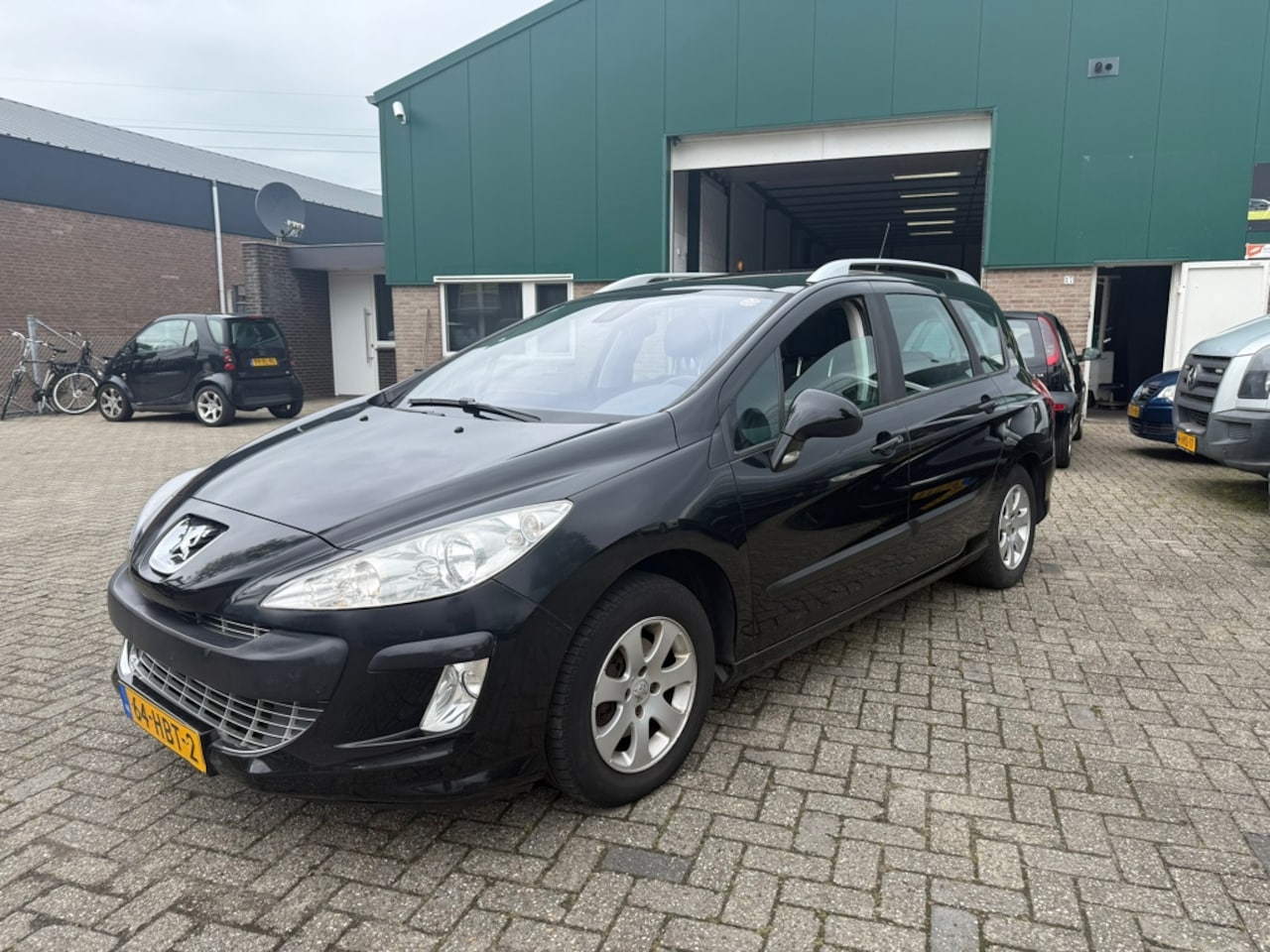 Peugeot 308 SW - 1.6 AUT 7Pers Airco Cruise Trekhaak Navi - AutoWereld.nl