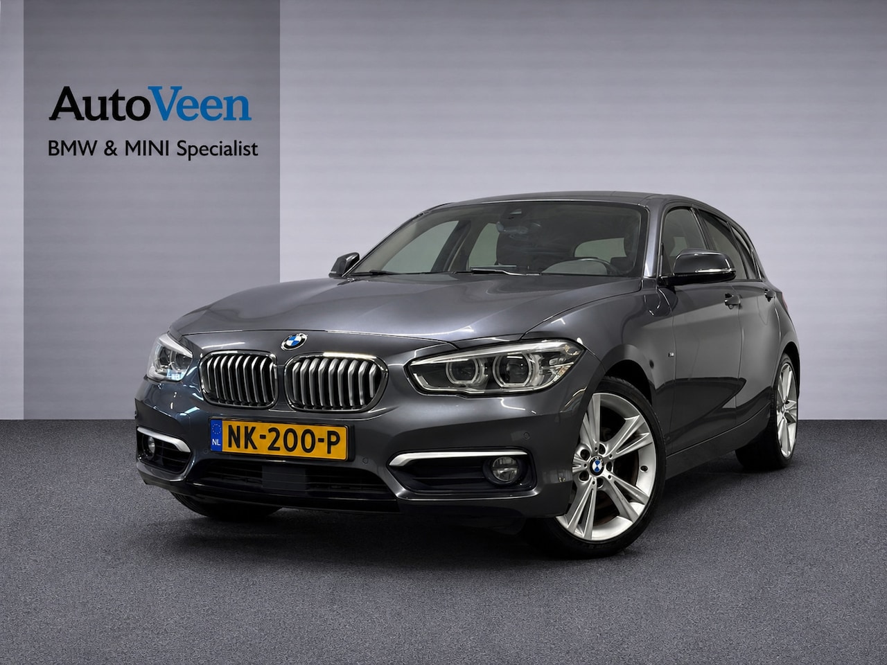 BMW 1-serie - 118i Centennial High Executive (M-SPORT, LED, LEDER, NAVI, STOELVERWARMING) - AutoWereld.nl