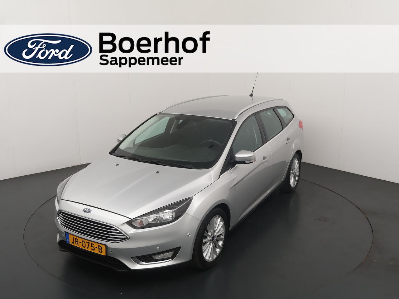 Ford Focus Wagon - 125pk Titanium | Nwe. distributieriem | Trekhaak | Voorruit verwarmd | Camera | Clima | Cr - AutoWereld.nl
