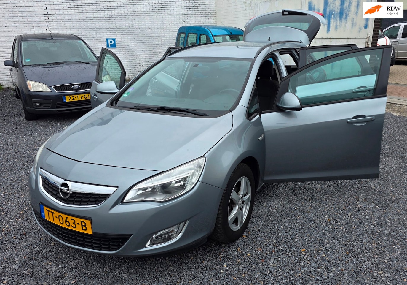 Opel Astra Sports Tourer - 1.4 Turbo Sport ZEER NETJES RIJKLAAR - AutoWereld.nl