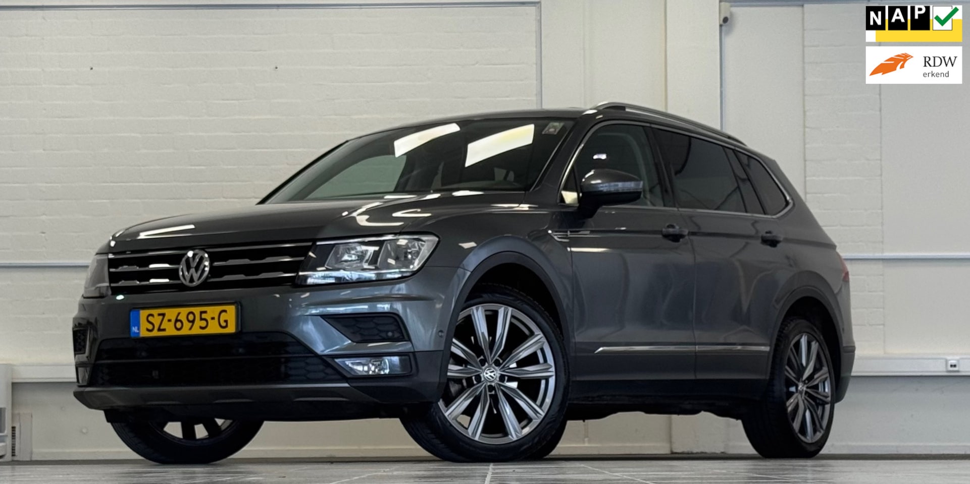 Volkswagen Tiguan Allspace - 1.4 TSI Comfortline Business 7p. Camera Trekhaak Navi - AutoWereld.nl