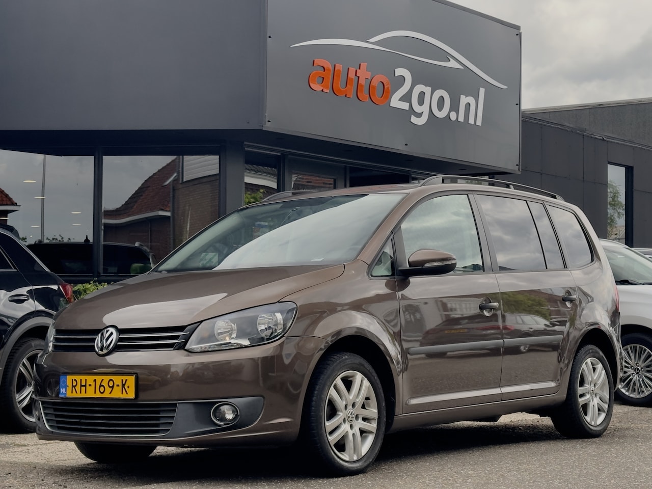 Volkswagen Touran - 1.2 TSI EASYLINE 7PERS 153 d.Km. NAVI AIRCO LMV PDC - AutoWereld.nl