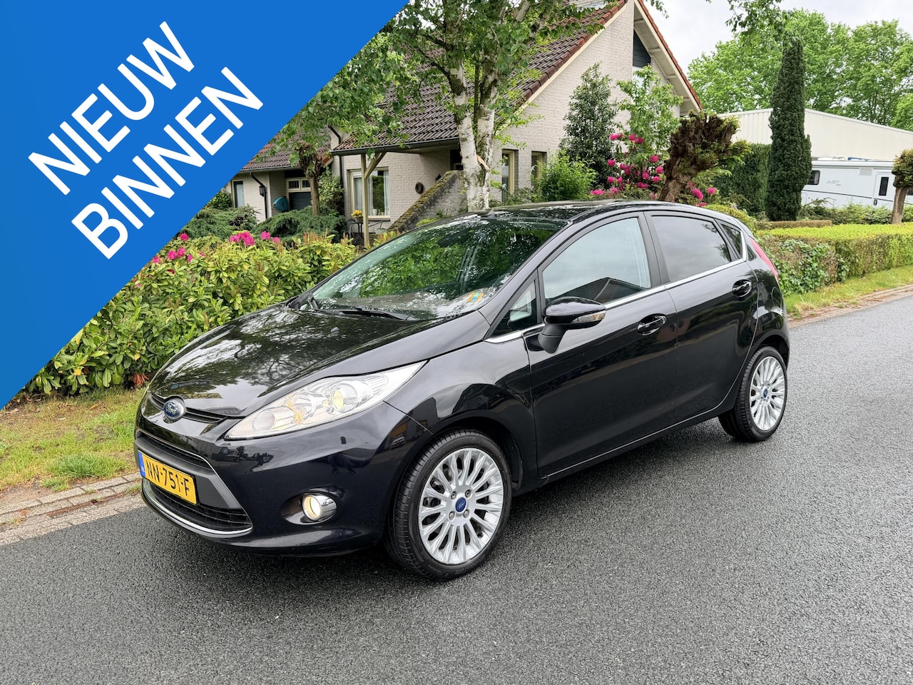 Ford Fiesta - 1.4 Ghia 97PK Automaat•Airco - AutoWereld.nl