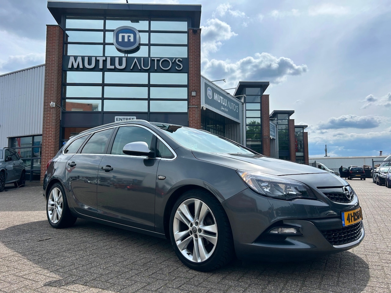 Opel Astra Sports Tourer - 1.4 Turbo Sport NAP NAVI PDC APK Airco - AutoWereld.nl