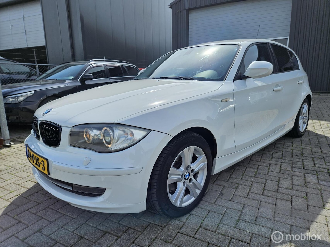 BMW 1-serie - 116i Business Line Ultimate Edition AUTOMAAT met NIEUW KETTING. - AutoWereld.nl