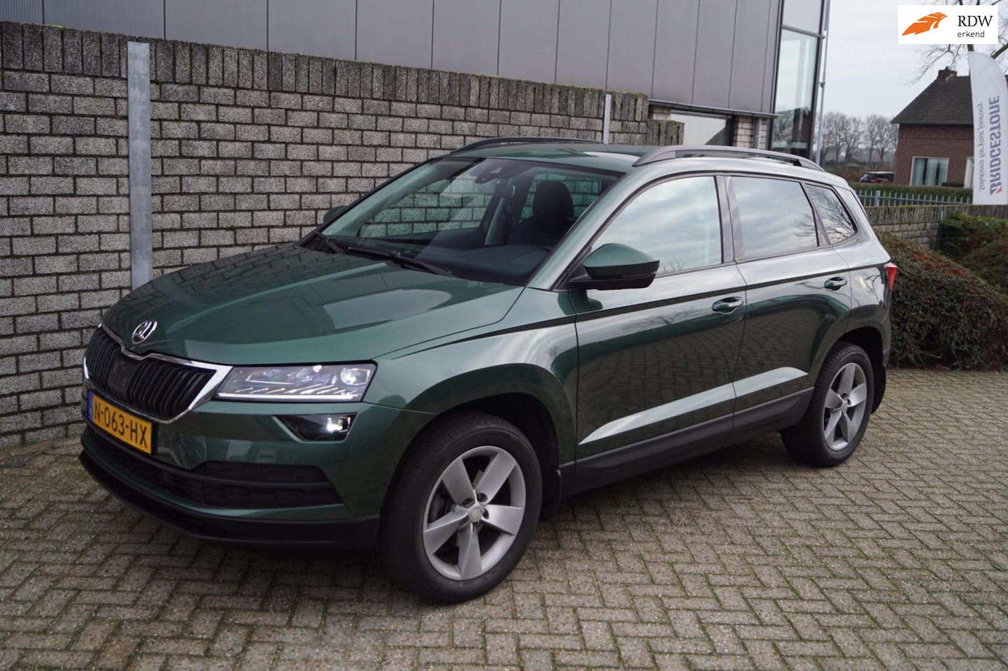 Skoda Karoq - 1.5 TSI ACT Sportline BNS Autom Leder Sportst Stoelverw Navi Camera LED Kopl Adaptieve Cru - AutoWereld.nl