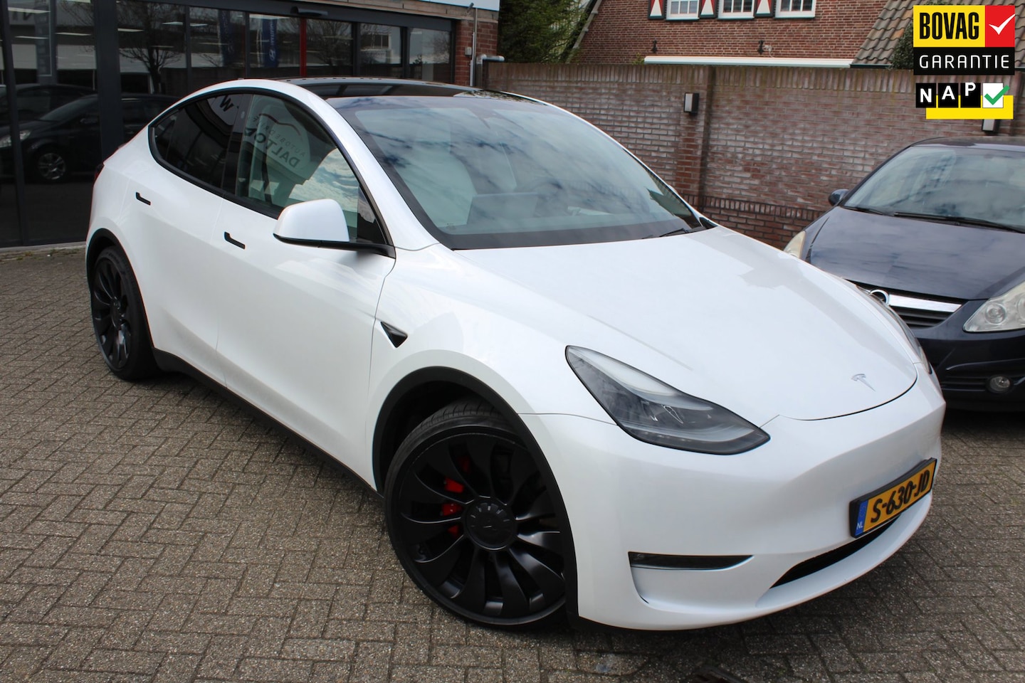 Tesla Model Y - Performance AWD 75 kWh SOH 92,2 % WIT LEER / 21"LMV / INCL. BTW - AutoWereld.nl
