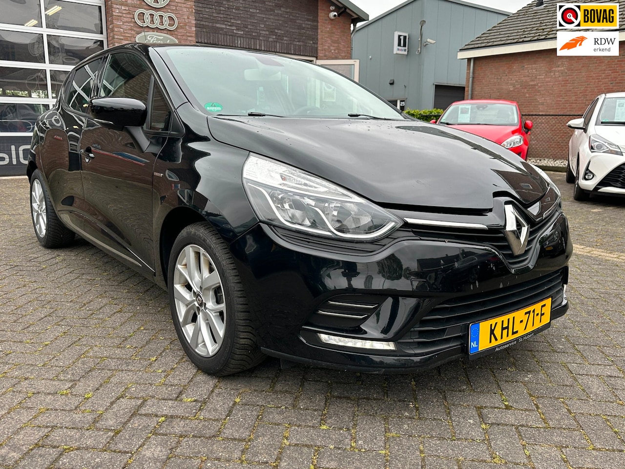 Renault Clio - 1.2 Limited. Navi. Clima. Cruise. PDC. - AutoWereld.nl
