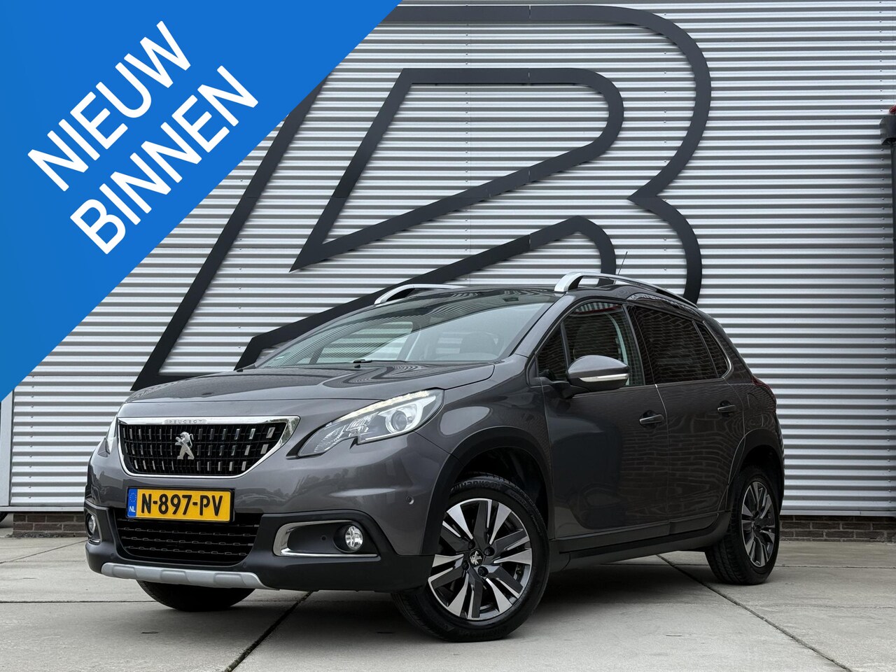 Peugeot 2008 - 1.2 PureTech Allure 2e Eigenaar|Navi|Pano|Camera|Trekhaak|Clima|Cruise|Stoelverwarming|Car - AutoWereld.nl