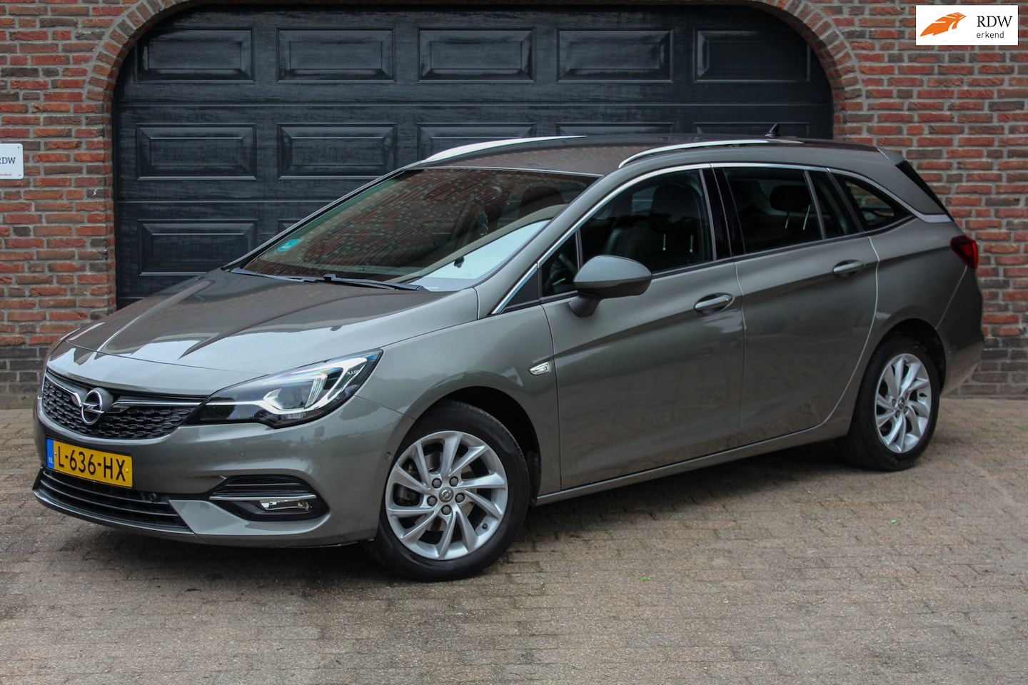 Opel Astra Sports Tourer - 1.2 Edition 2020 - camera - carplay - cruise - stoel/stuurverwarming - AutoWereld.nl