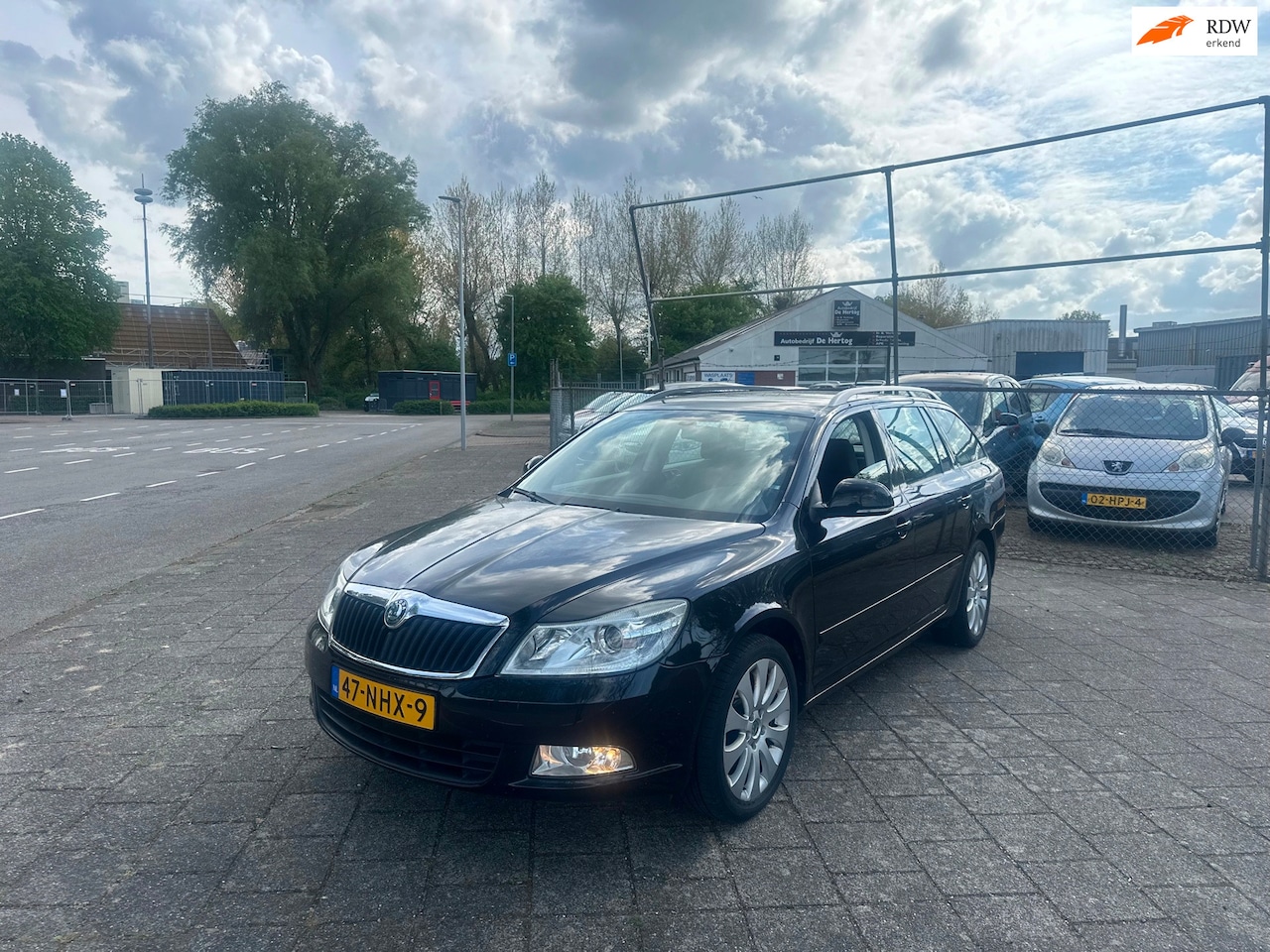 Skoda Octavia Combi - 1.2 TSI Elegance Airco PDC Cruise - AutoWereld.nl