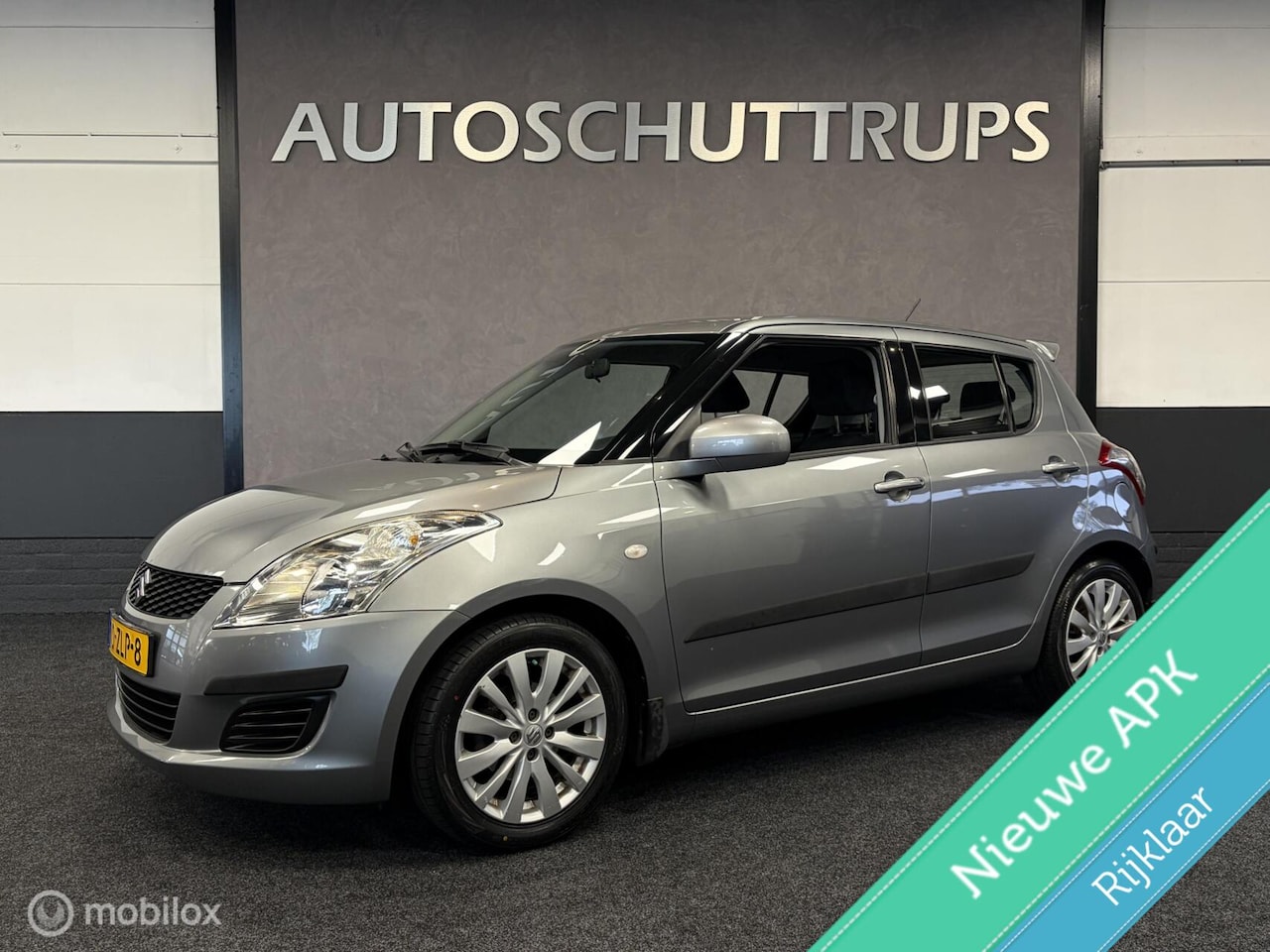 Suzuki Swift - 1.2 Bandit 1e EIGENAAR / VOLLEDIG DEALER O.H. / AIRCO / CRUISE / STOELVERW. / LMV / - AutoWereld.nl