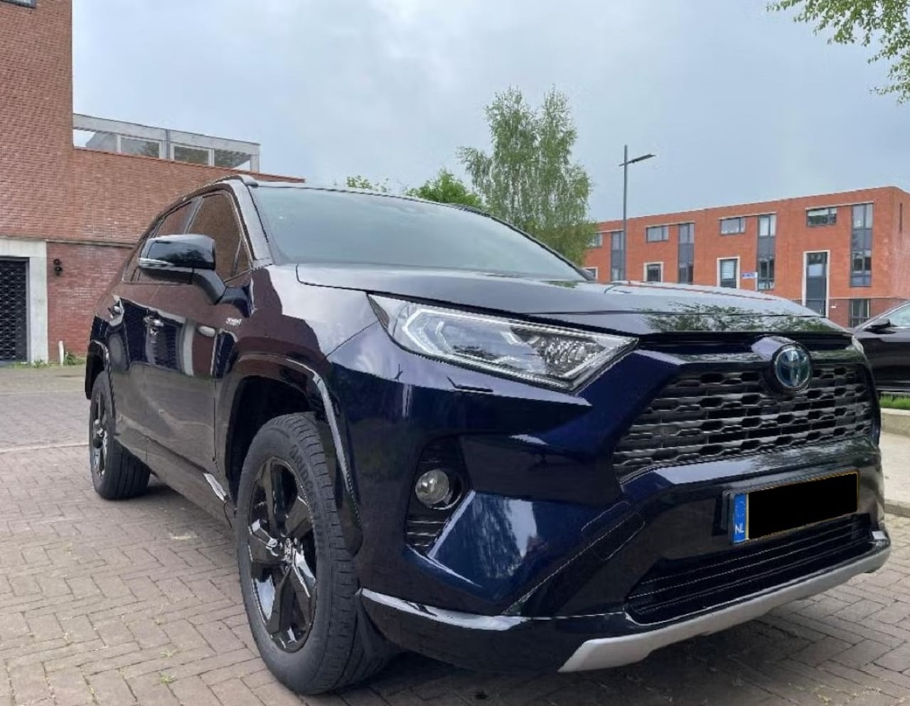 Toyota RAV4 - 2.5 Hybrid Style CVT Bi-Tone - AutoWereld.nl