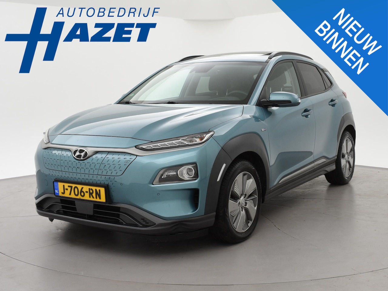 Hyundai Kona Electric - EV PREMIUM SKY 64 kWh 100% SOH *CERAMIC BLUE* + SCHUIFDAK | STOELVERW. V+A | STOELVENTILAT - AutoWereld.nl
