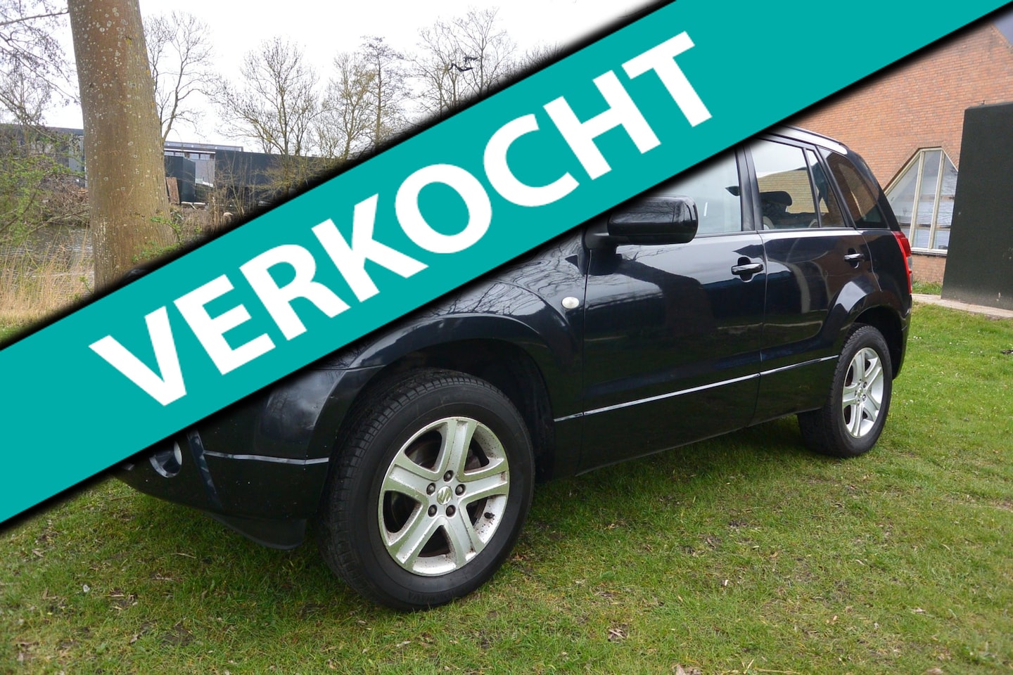 Suzuki Grand Vitara - 2.0-16V Exclusive/4WD/airco/cruise/navi/camera - AutoWereld.nl