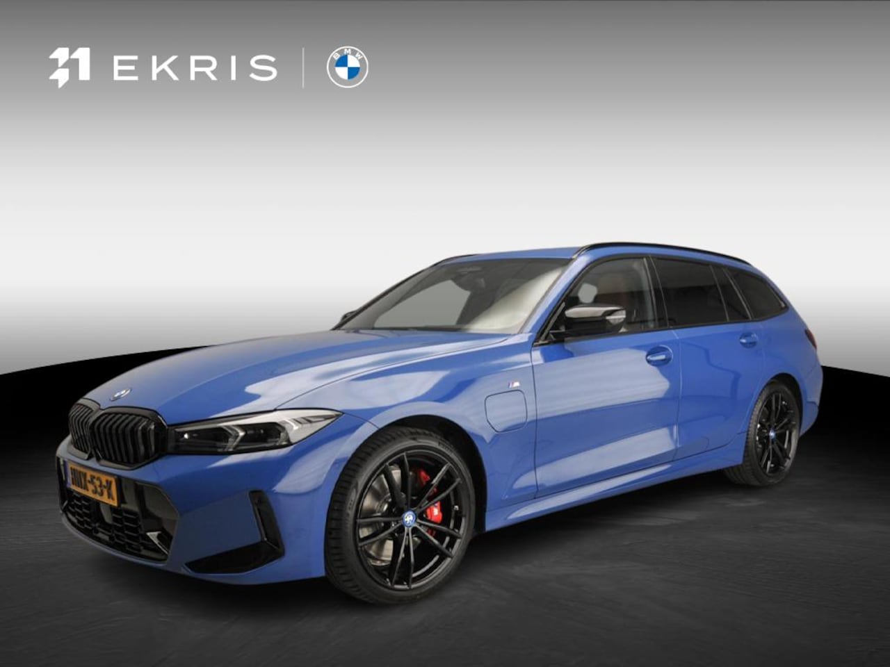 BMW 3-serie Touring - 330e | Individual Lak | M-Sportpakket | LED | HUD | Trekhaak | Elektr. zetels | DAB | Harm - AutoWereld.nl