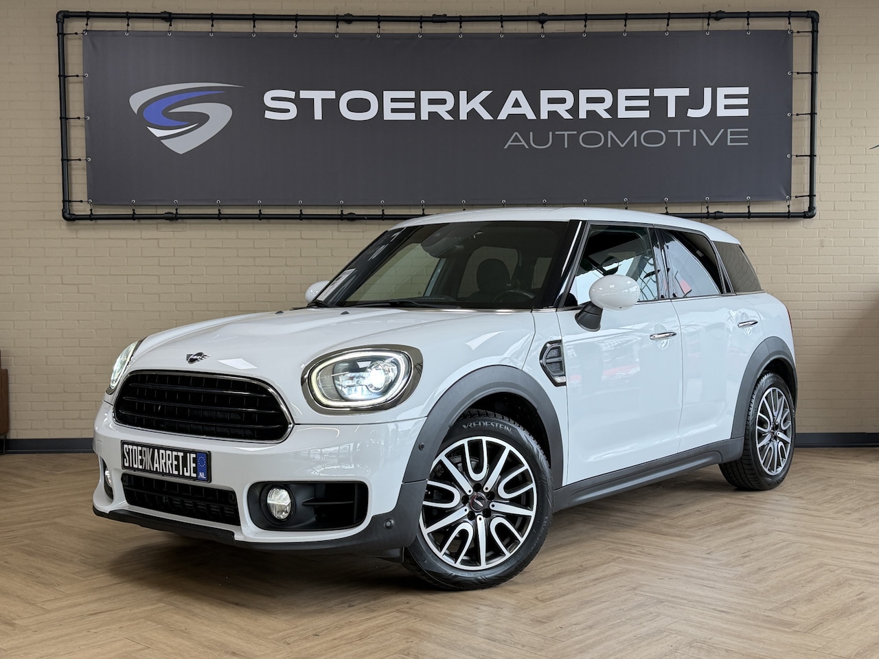 MINI Countryman - 1.5 One Pepper Stoelverwarming | Carplay | Cruise | Navi | PDC | Keyless | Led | Sportstoe - AutoWereld.nl